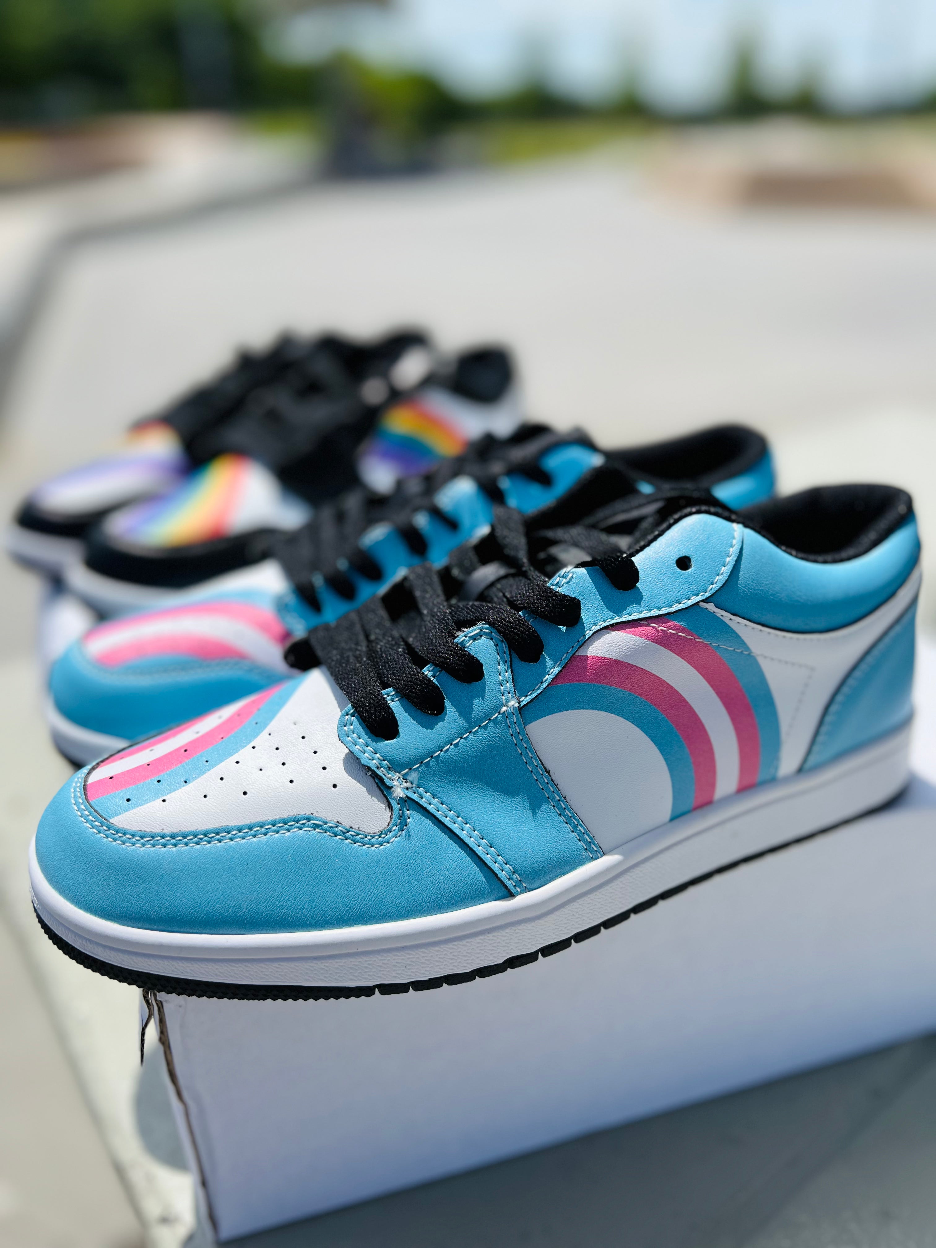 Trans pride low-top leather sneakers, side view — Rose Gold Co