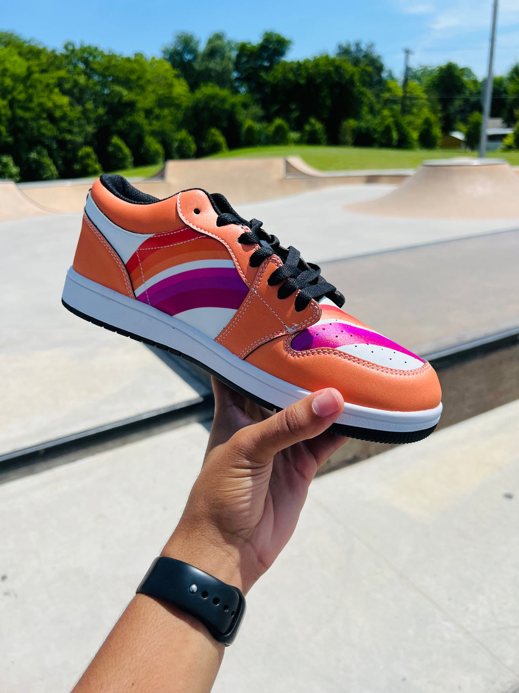 Sunset lesbian pride low-top sneakers, front view — Rose Gold Co