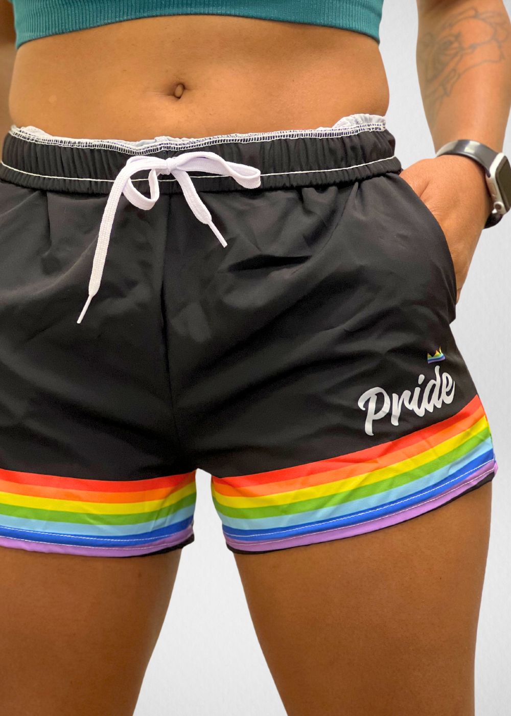 Black rainbow pride athletic shorts, front view — Rose Gold Co