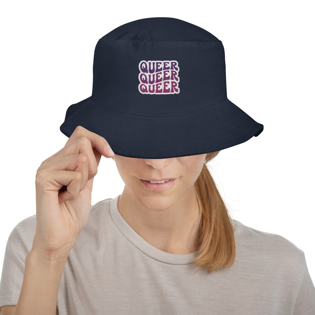 Queer embroidered bucket hat, navy, front view 2 — Rose Gold Co