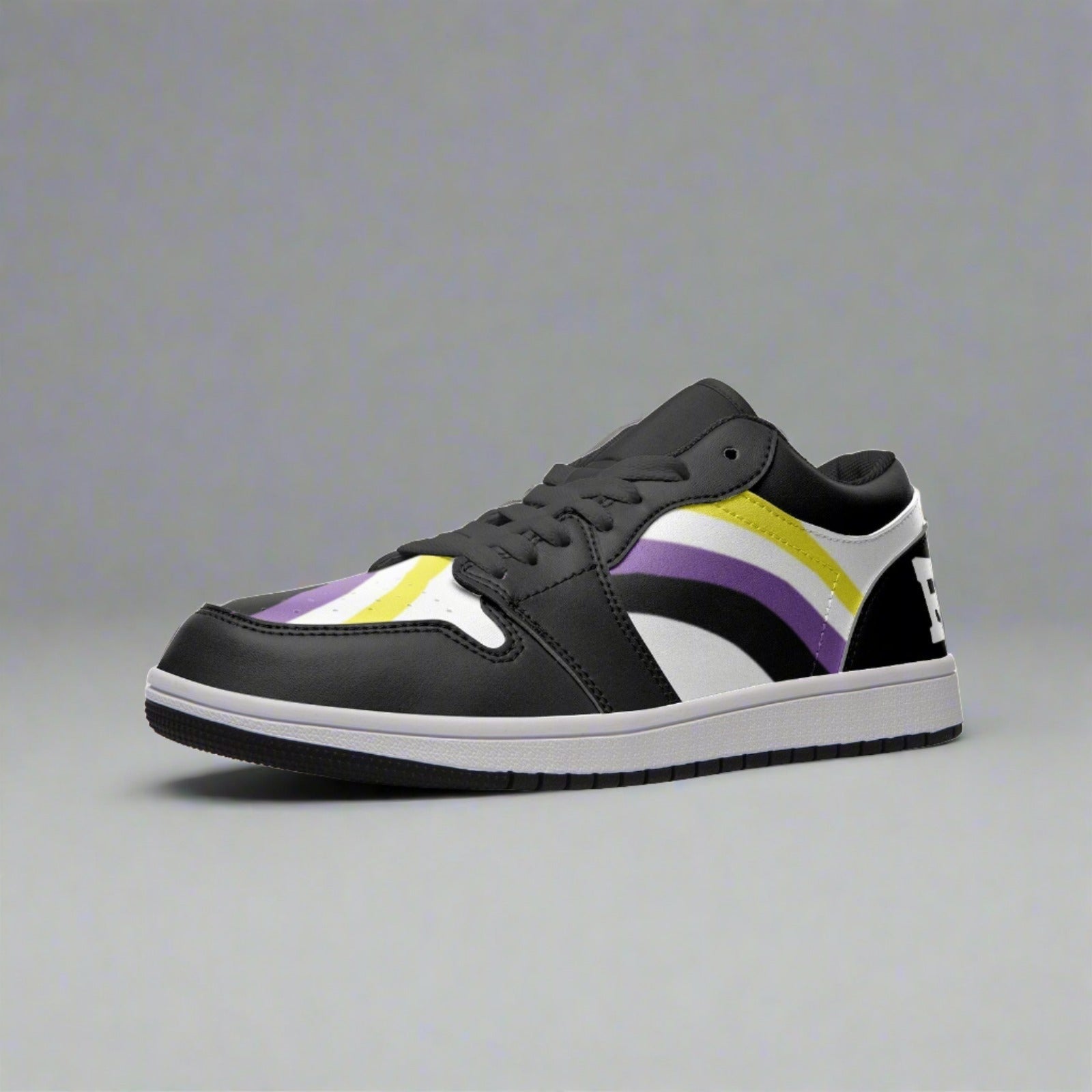 Non-binary pride black low-top sneakers, detail view — Rose Gold Co