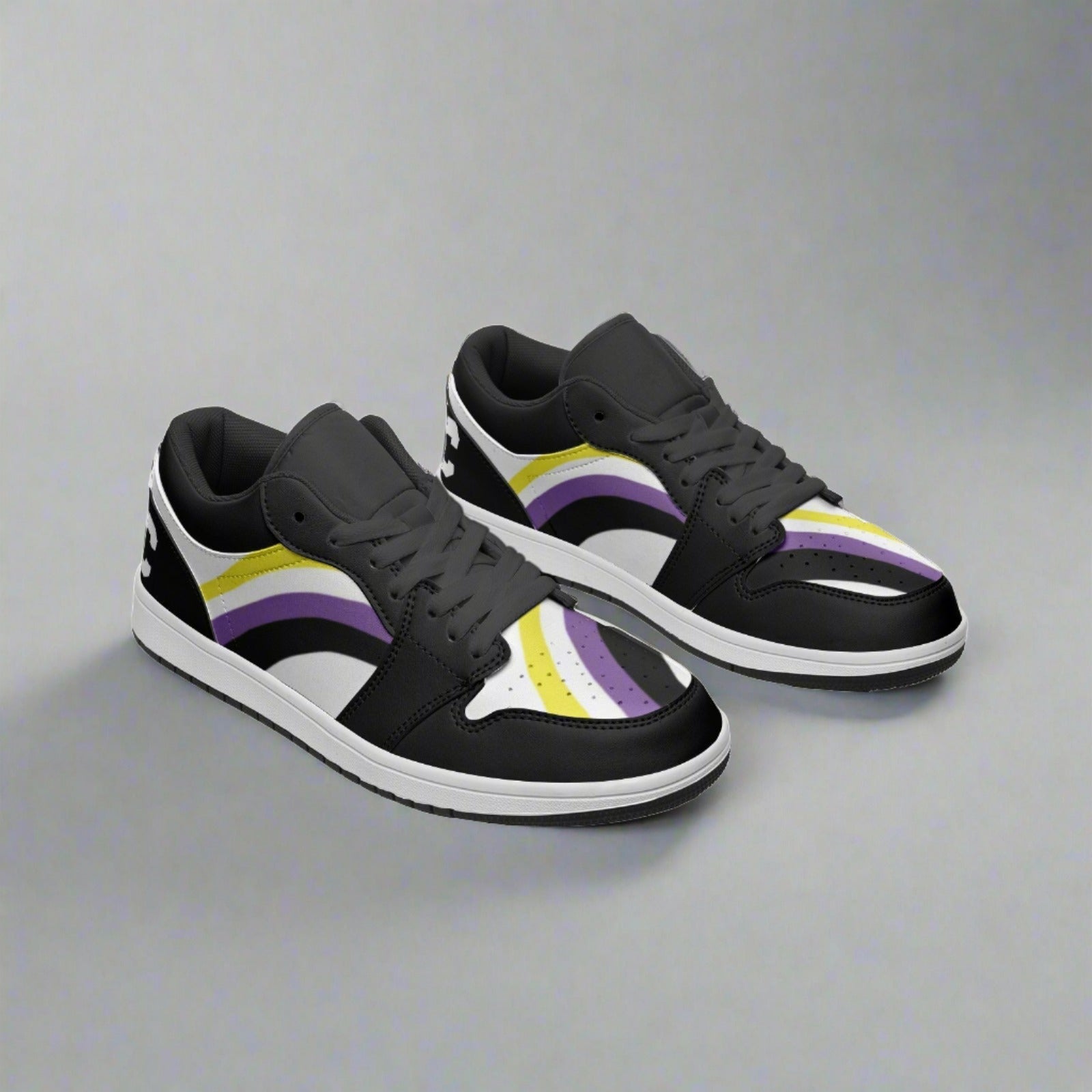 Non-binary pride black low-top sneakers, flat lay — Rose Gold Co