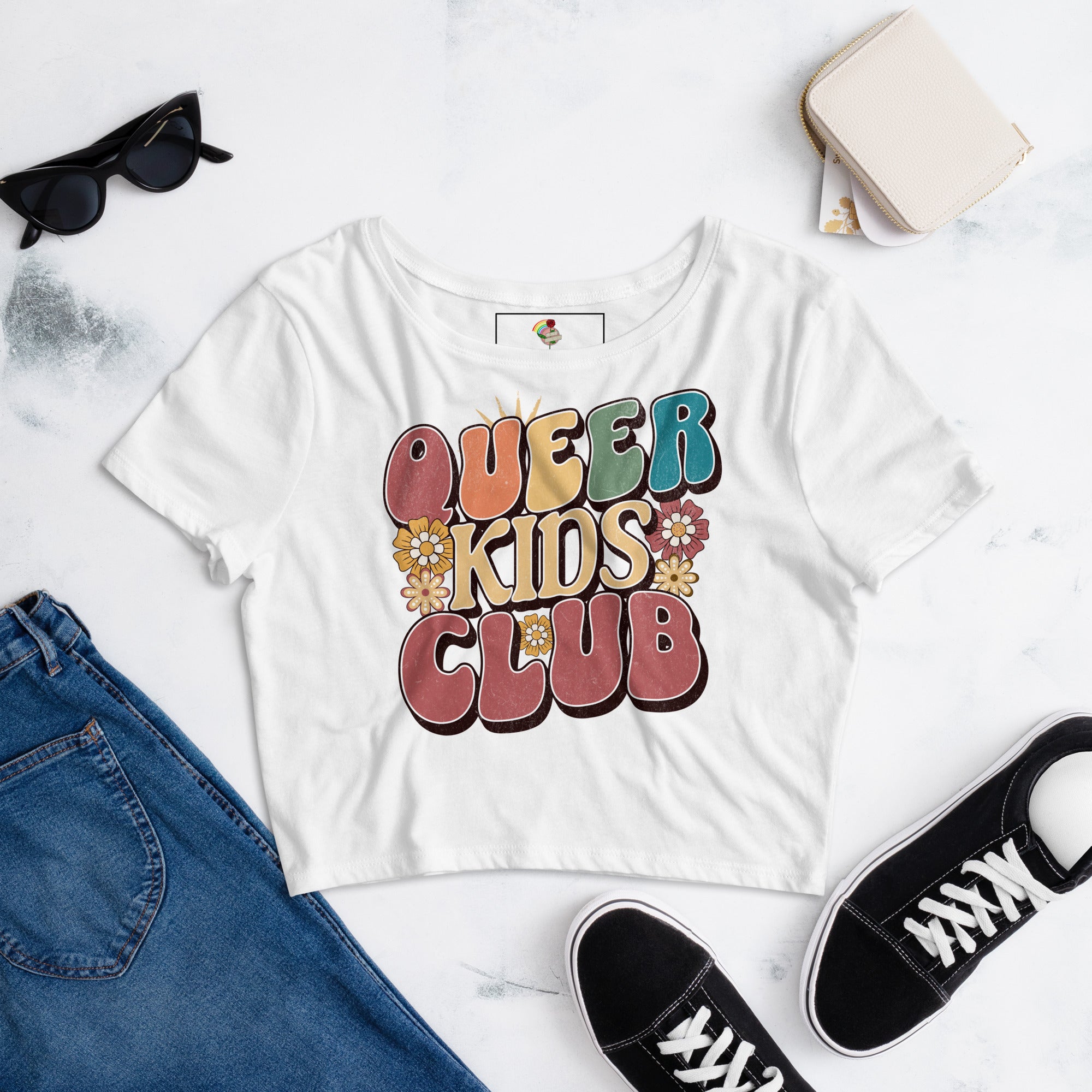 Queer Kids Club crop tee, flat lay — Rose Gold Co